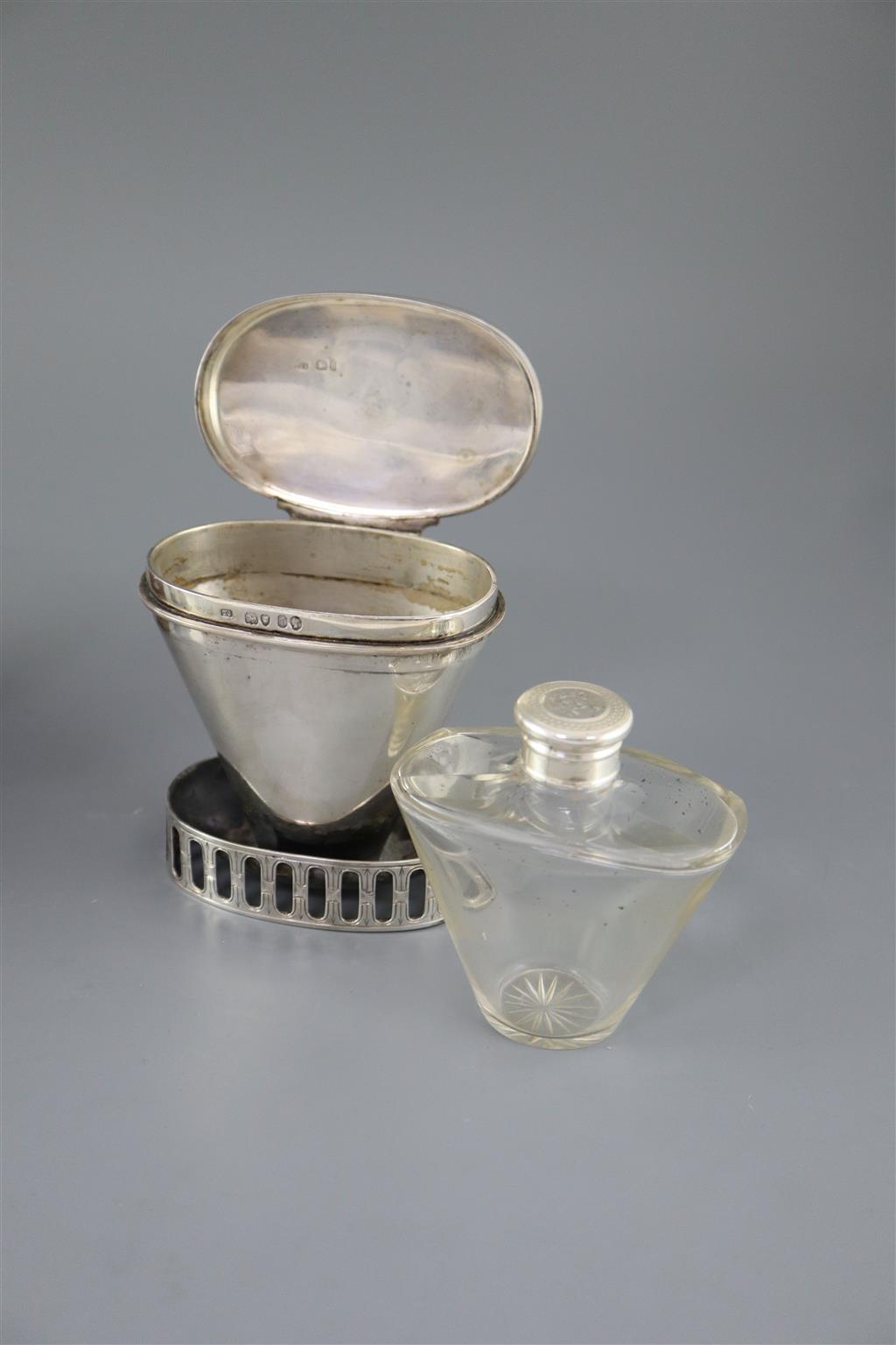 A leather cased Victorian travelling silver hip flask and warmer, by Thomas Johnson I,